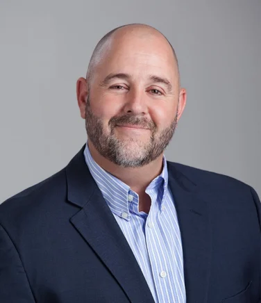 Headshot of Brett Rustand