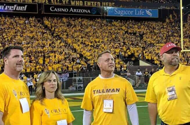 Crest Insurance staff on the field at an Arizona State football game