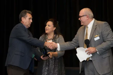 Award recipients shaking hands at the SHRM Celebrating Innovation event