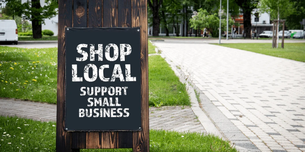 Sign reading Shop Local, Support Small Business