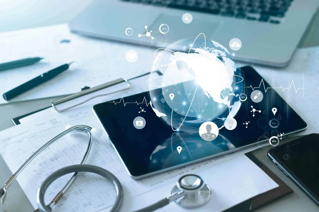 Tablet with digital health icons beside a stethoscope