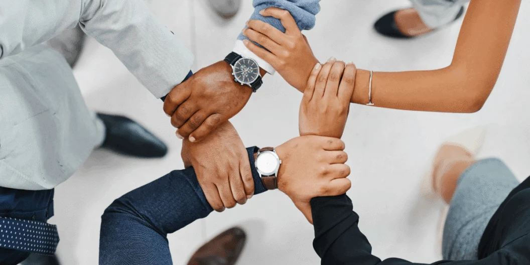 People holding arms