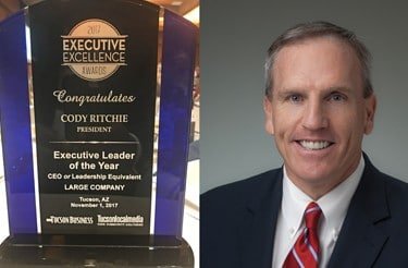 Cody Ritchie with his Executive Leader of the Year award
