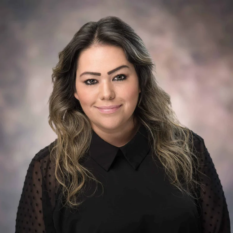 Headshot of Caprice Hidalgo