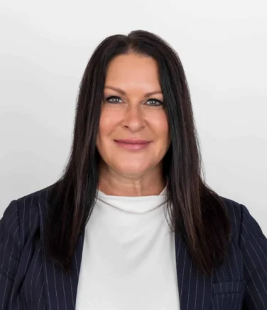 Headshot of Carmela Reicks