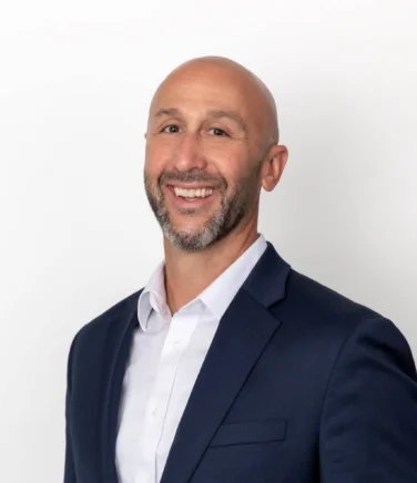 Headshot of Derek Lesmann