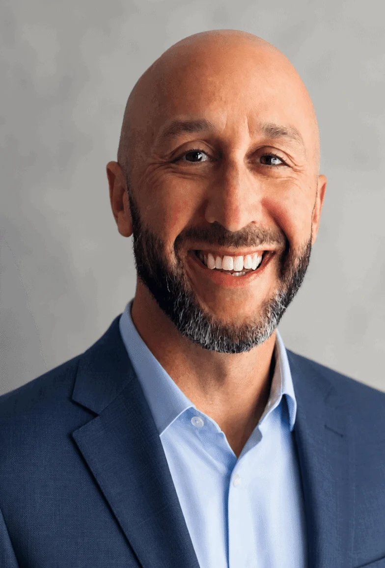 Headshot of Derek Lesmann