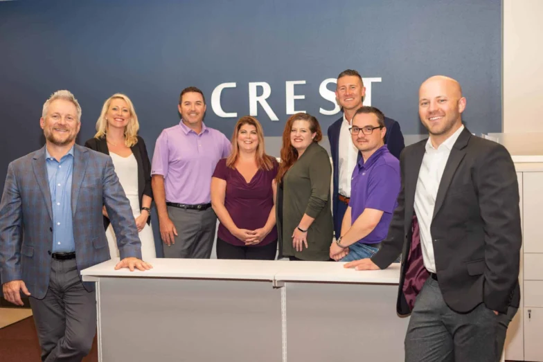 Crest Insurance Fort Collins team in their office