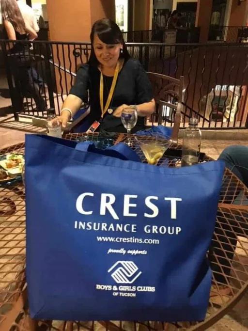 Crest Insurance Group tote bag at a Boys & Girls Club of Tucson event