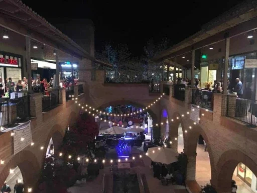 Evening outdoor courtyard event with string lights