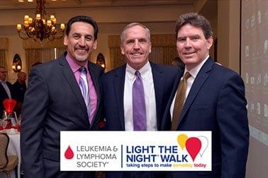 Three men at a Leukemia & Lymphoma Society Light The Night Walk event