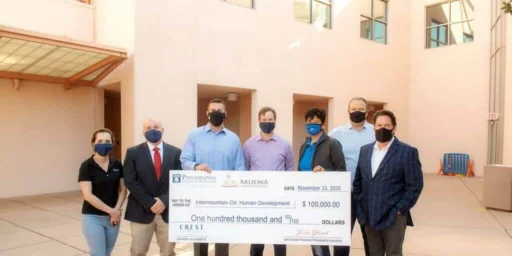 Group presenting a $100,000 check to Intermountain Centers for Human Development