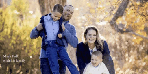 Mark Polk with his family outdoors