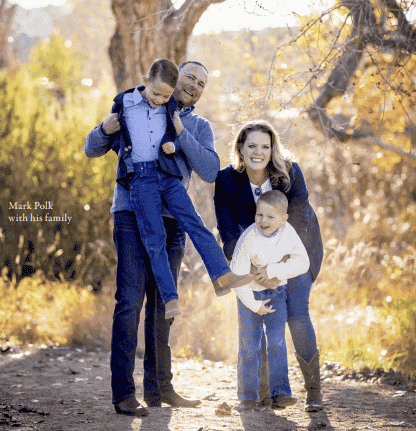 Mark Polk with his family outdoors