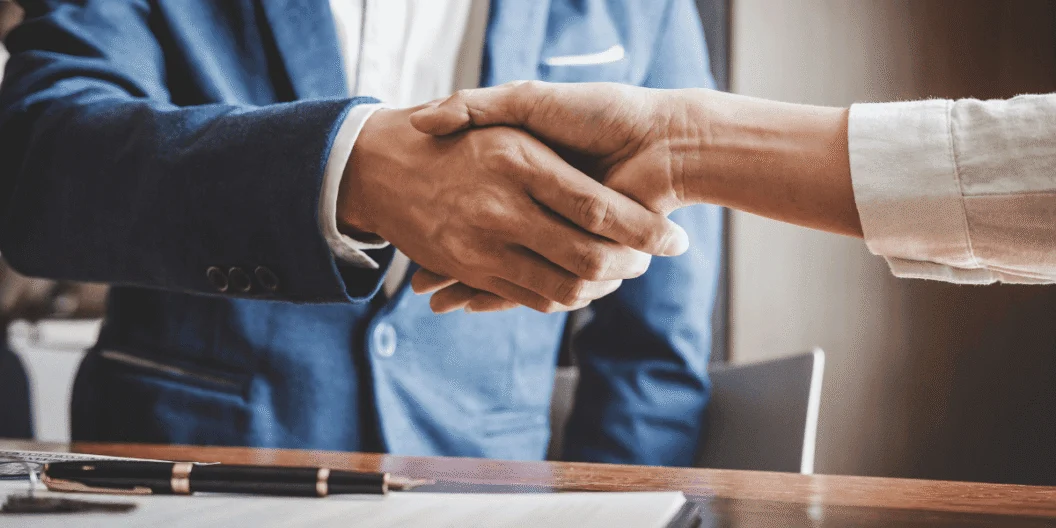 Two people shaking hands