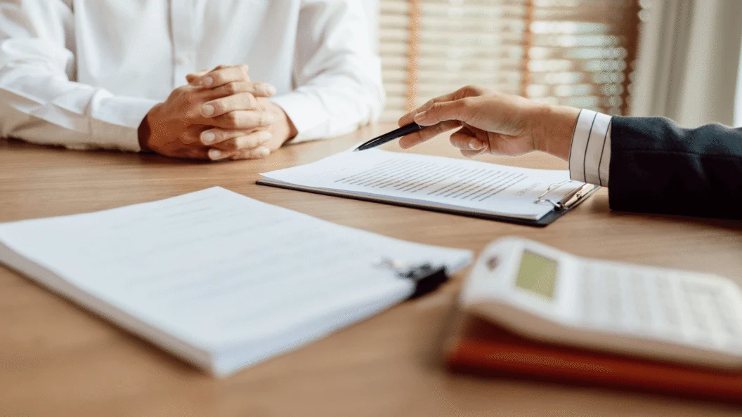Person going over business insurance plan